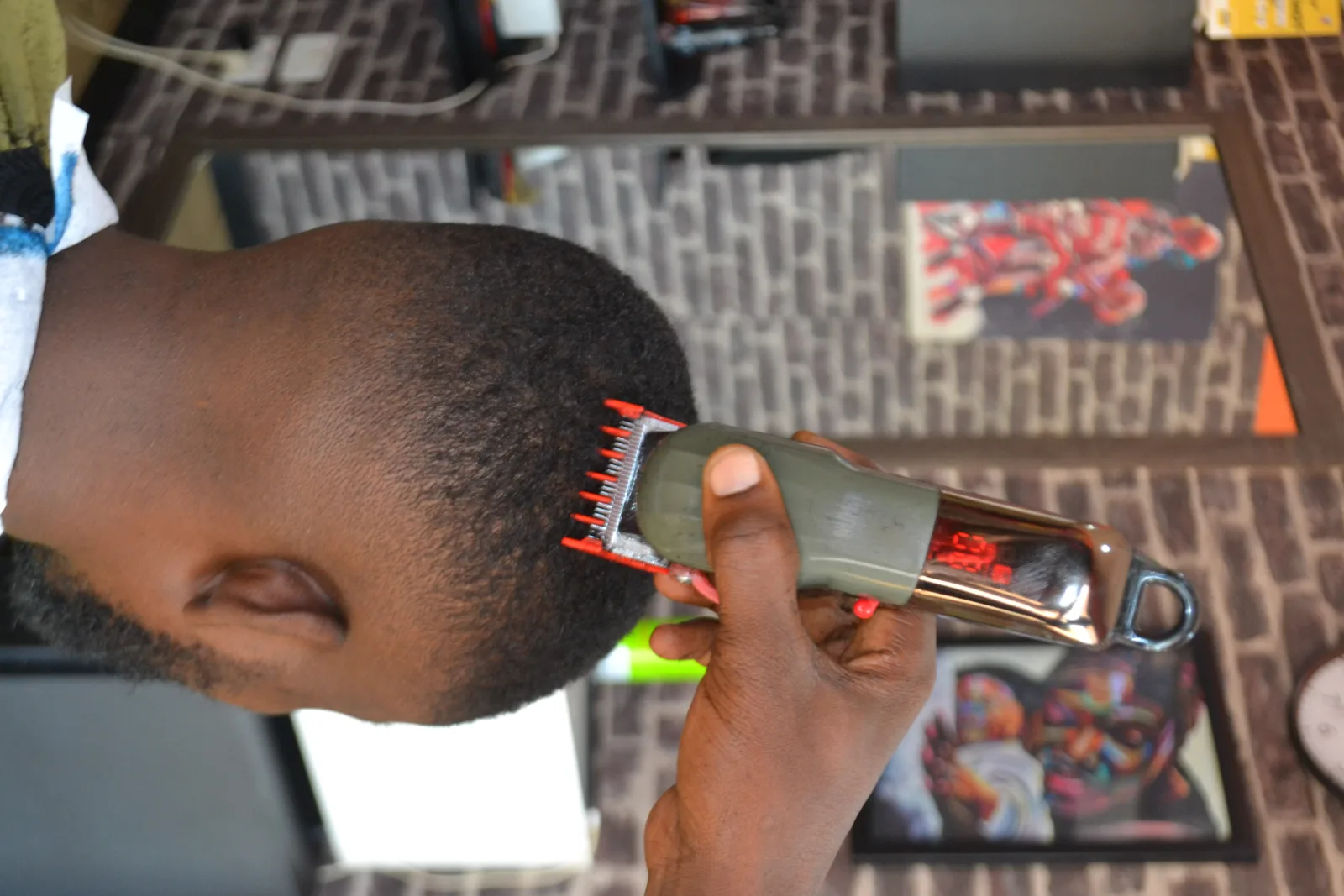 A hairstylist cutting hair
