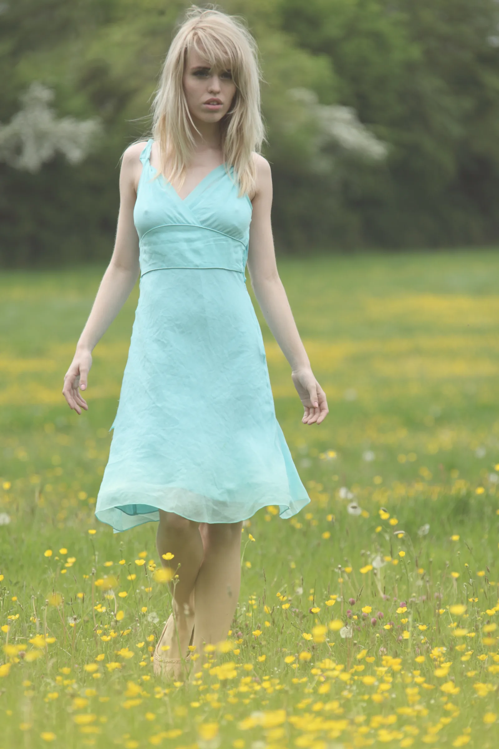 Blonde-haired woman in a Somerset meadow.