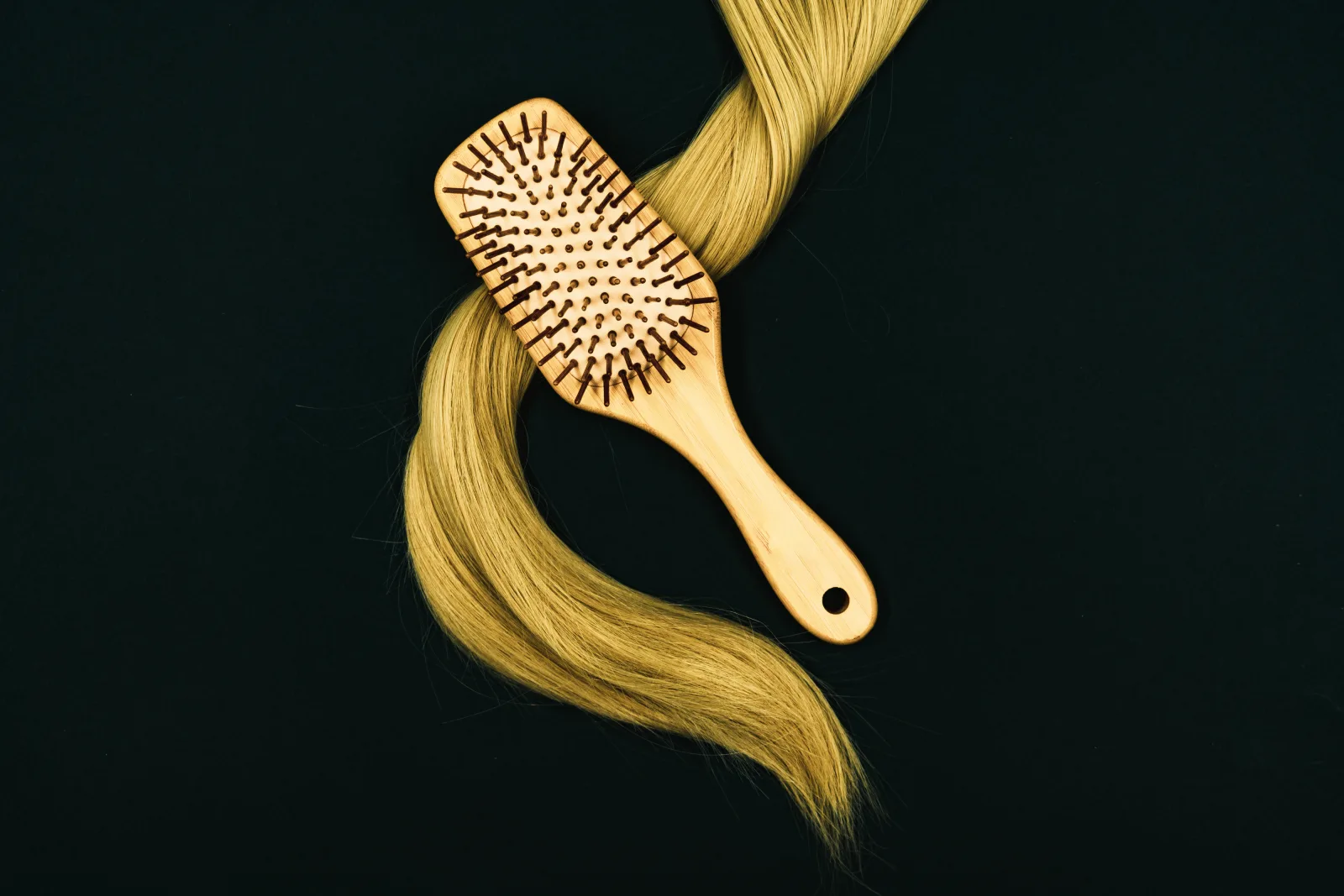 This photo shows long blonde hair that's just been brushed. We created this image as part of a tutorial on how to style long hair, but we've now decided to release it under Creative Commons to share with you! Please feel free to use this image, but be sure to credit us when you do by including a link to geehair.com/