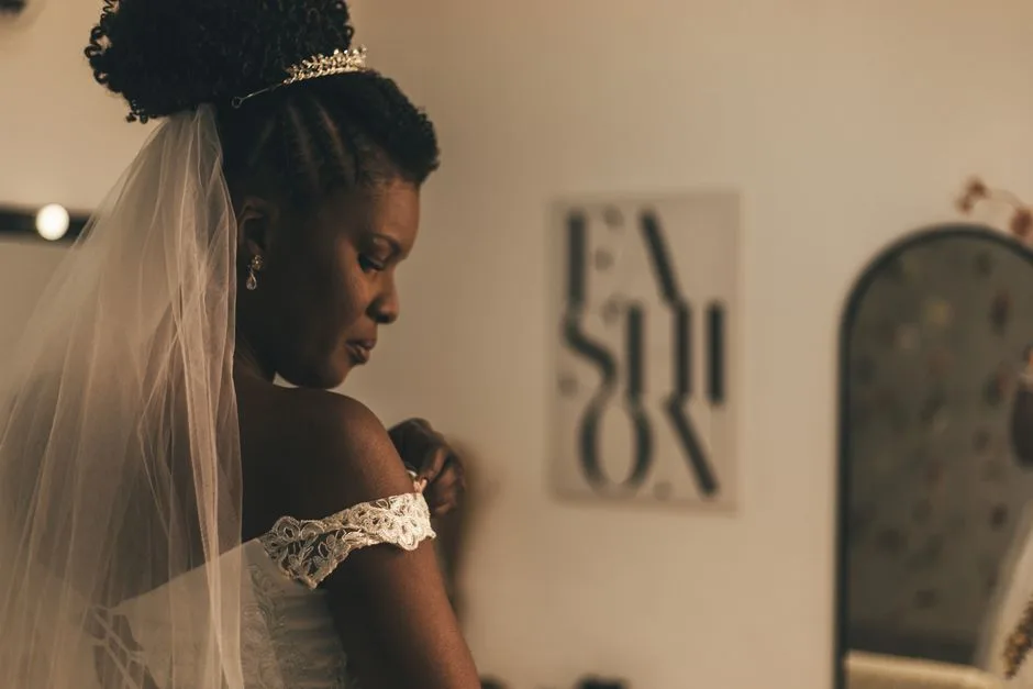 A beautiful bride in a bridal suite, preparing for her wedding day with elegance and grace.